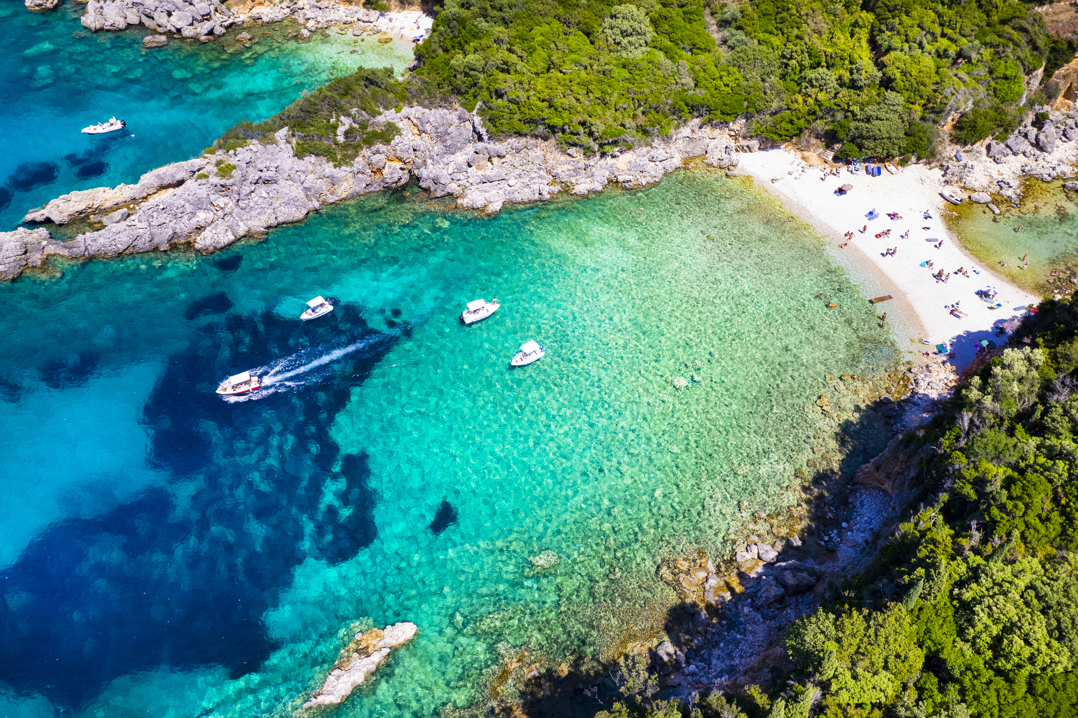 Corfu island, Greece . Aerial view of beautiful double beach with turquoise clear waters Limni beach Glyko near Paleokastritsa