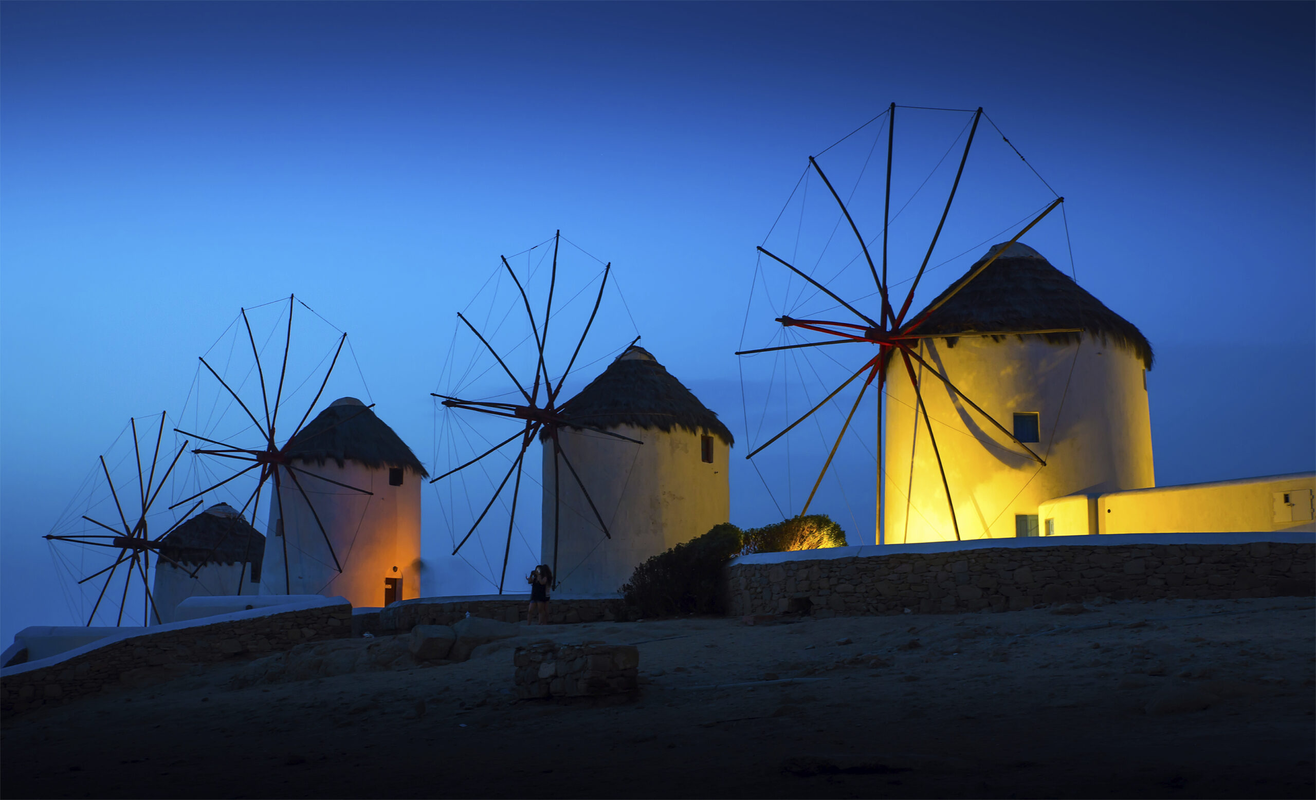 Mills on the Greek island in the sunset