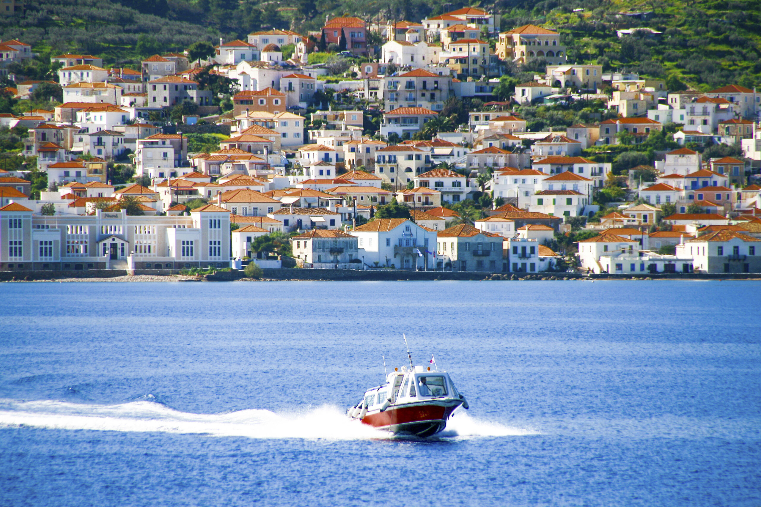 Small,Red,Motor,Boat,Transfer,People,To,Spetses,Island,,Greece